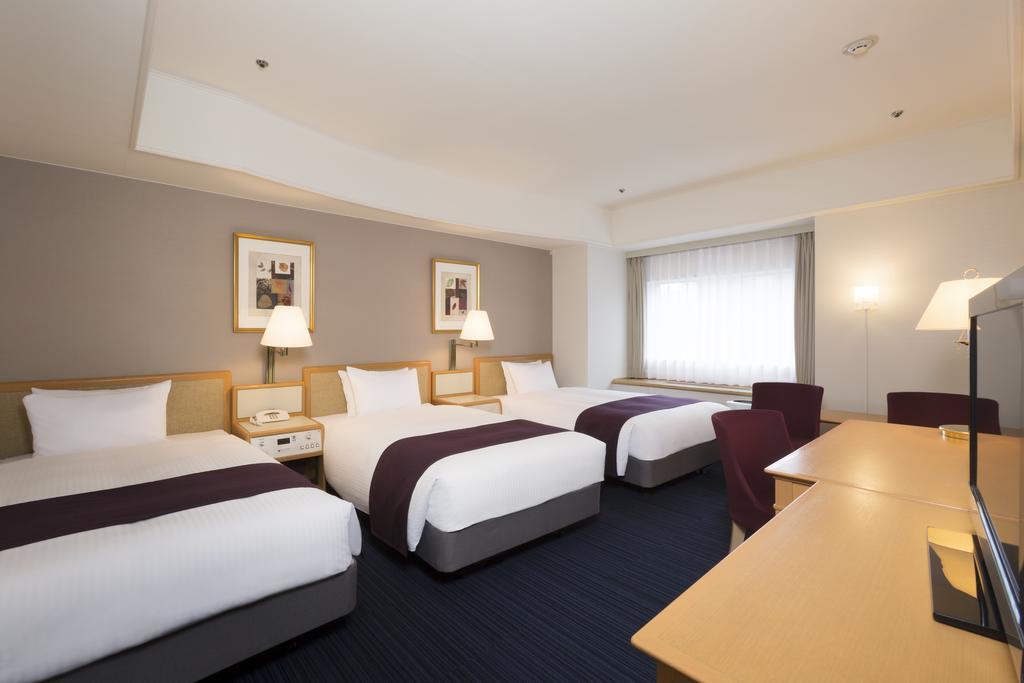 Sapporo Grand Hotel Extérieur photo A typical room at the hotel