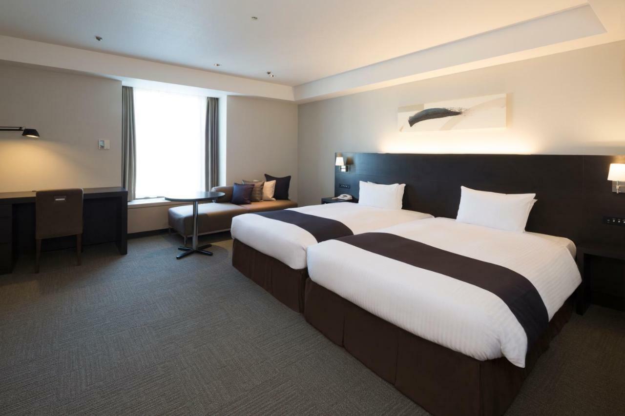 Sapporo Grand Hotel Extérieur photo A room at the hotel